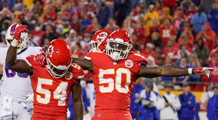 Oct 10, 2021; Kansas City, Missouri, USA; Kansas City Chiefs linebacker Willie Gay Jr. (50) celebrates with outside linebacker Nick Bolton (54) after a play against the Buffalo Bills during the game at GEHA Field at Arrowhead Stadium. Mandatory Credit: Denny Medley-USA TODAY Sports